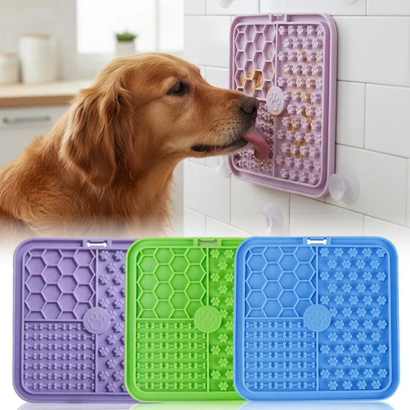 LickJoy Mat suction-mounted to a bathroom wall while a dog licks it during bath time